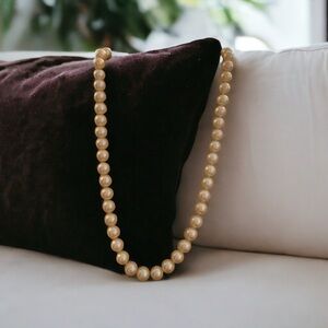 Beautiful faux pearls, clasp tests as diamonds